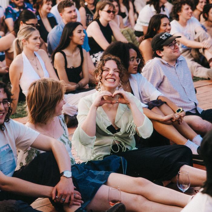 Crowd sitting and watching Nai Palm Live at the NFSA