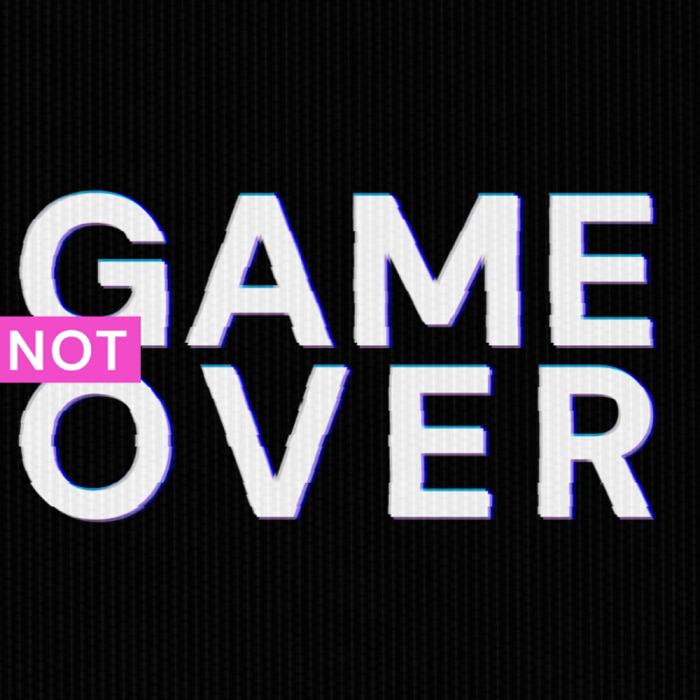 Computer screen with the words 'Game Not Over' on it.
