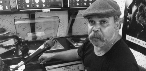Mac Silva at the control desk of Sydney's first Indigenous radio station, Radio Redfern