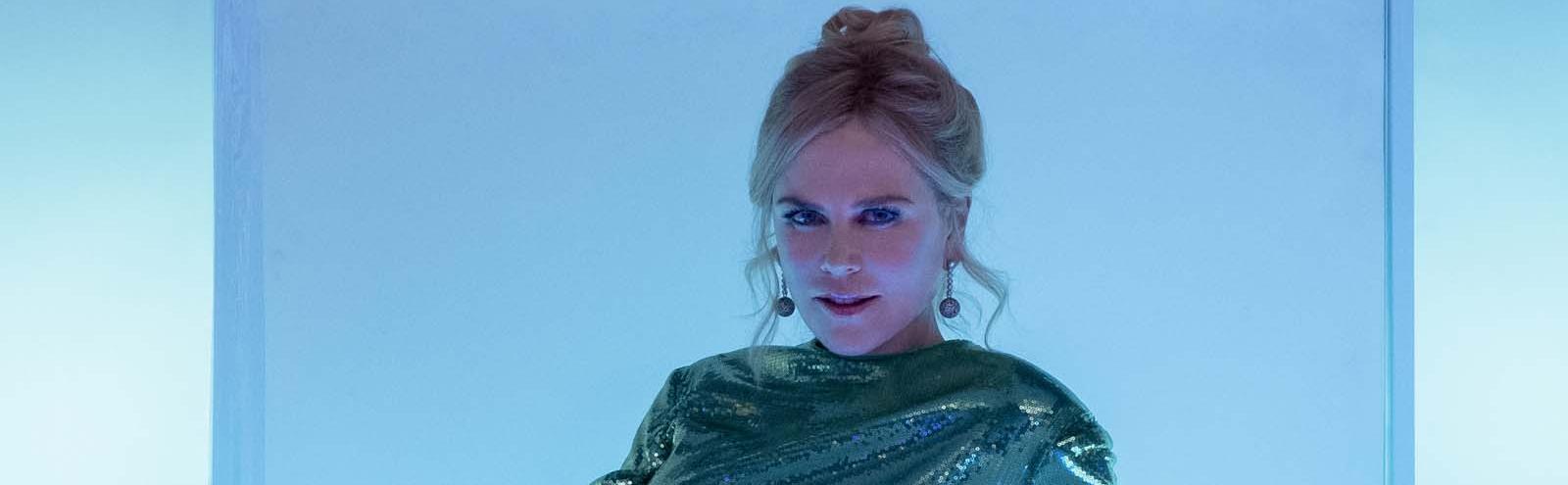 Nicole Kidman dressed in a sparkling green evening dress