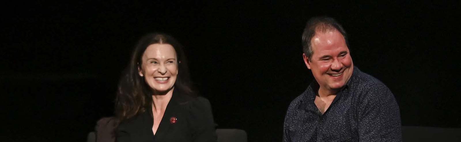 Tara Morice and Paul Mercurio laughing on stage during a Q&A session after a screening of Strictly Ballroom at the NFSA