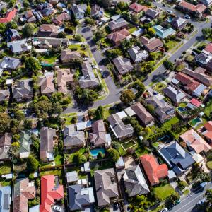 Aerial shot of houses in the outer suburbs of Melbourne.