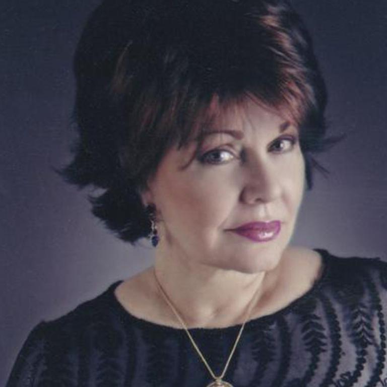 Singer Pilita Corrales wearing a gold pendant.