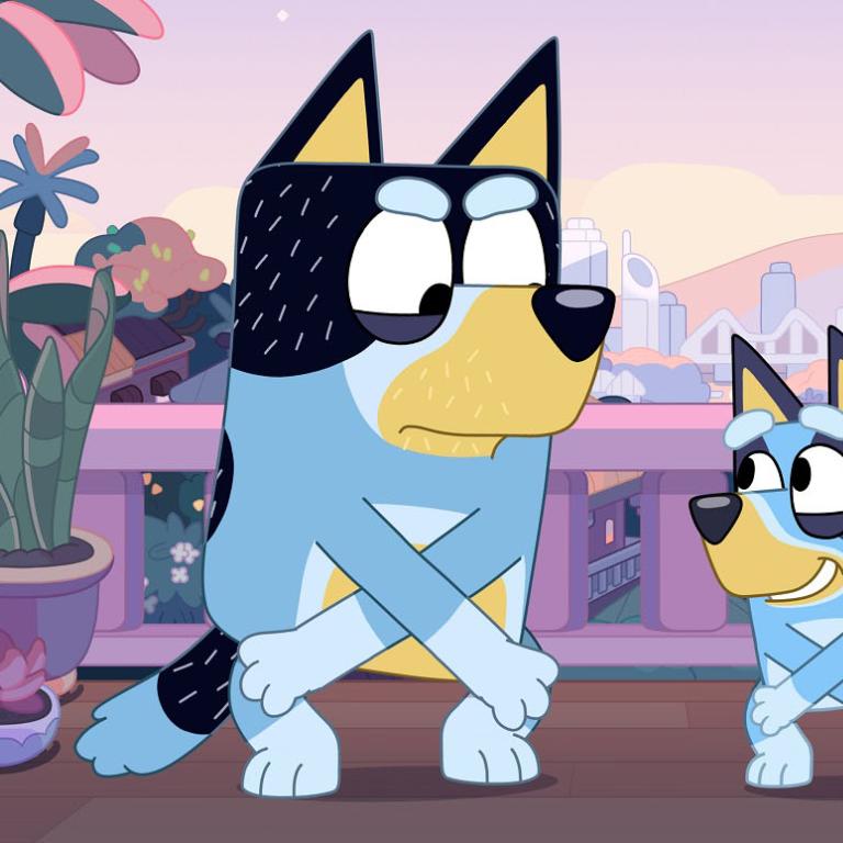 Animated still of two blue heeler dogs dancing in the twilight on a balcony.