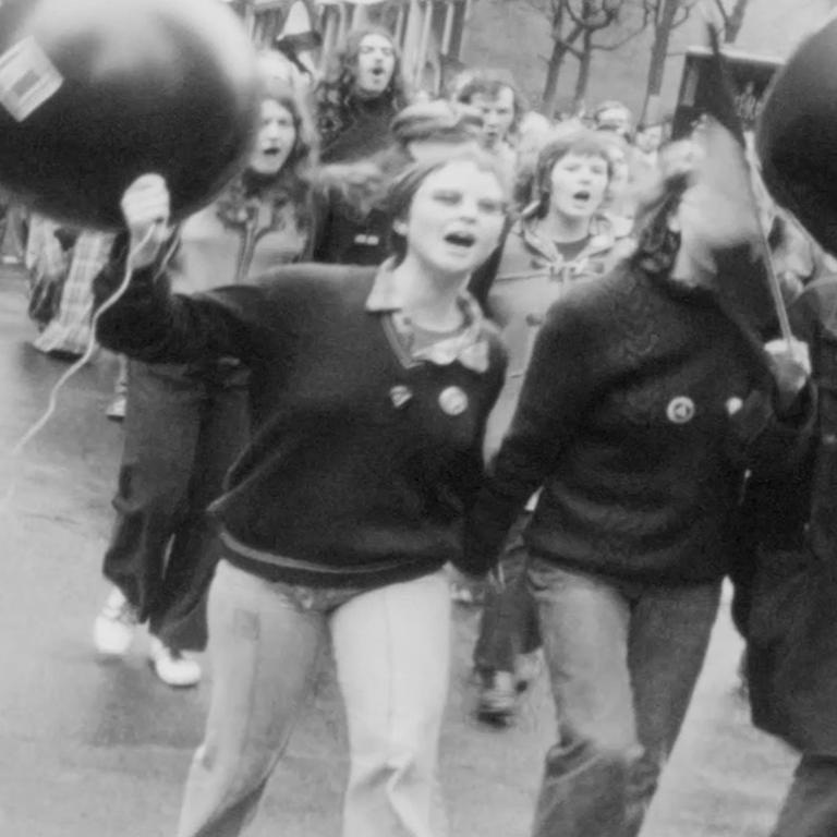 protest march, black and white image, 1973
