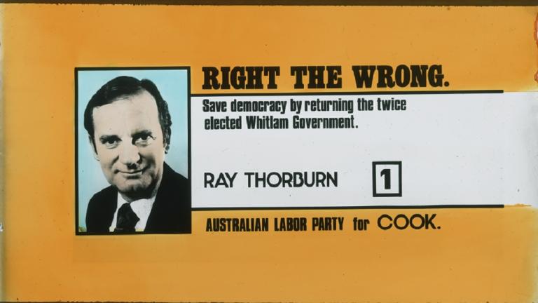 Orange and white background with colour portrait of Ray Thorburn. Full caption reads: ''Right the wrong. Save democracy by returning the twice elected Whitlam Government' Ray Thorburn 1 Australian Labor Party for Cook'.
