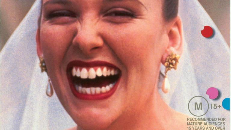 Australian advertising poster for Muriel's Wedding featuring Muriel (Toni Collette) smiling in her wedding dress