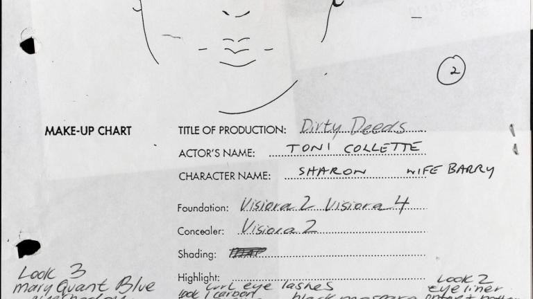Document for a make-up artist working on a film with a woman's face drawn on it and details about her film character and her make-up.