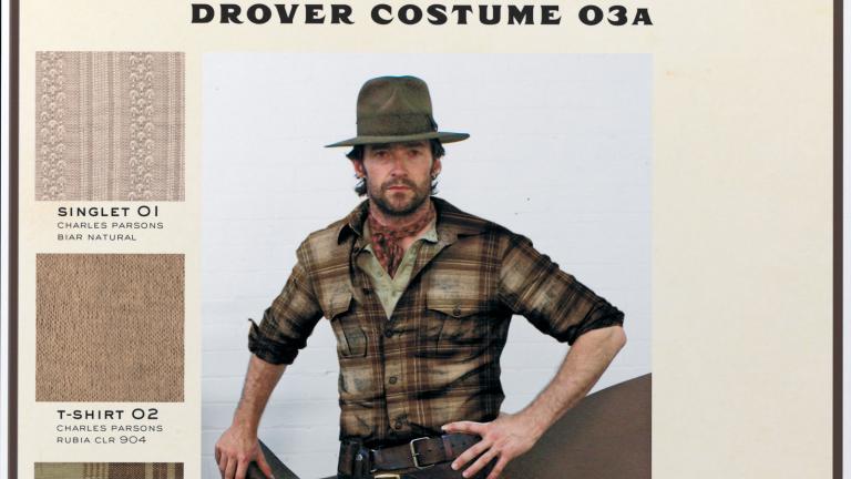 Page from a costume book showing a picture of actor Hugh Jackman in his 'Drover' costume for the film Australia, as well as descriptions of the elements making up his costume. 