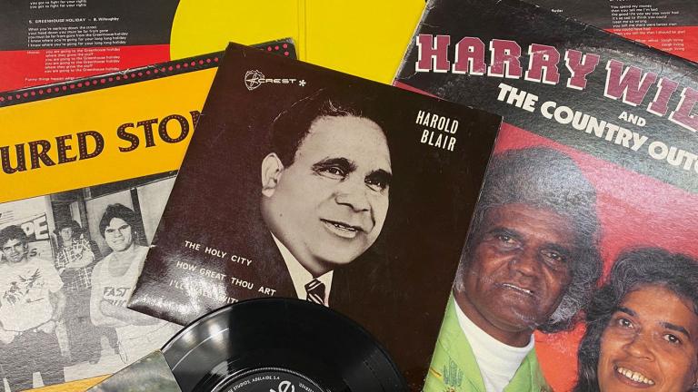 A collage of vinyl record covers including images of First Nations singers and bands.