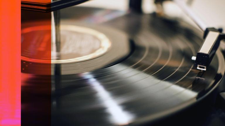 A vinyl record being played on a record player