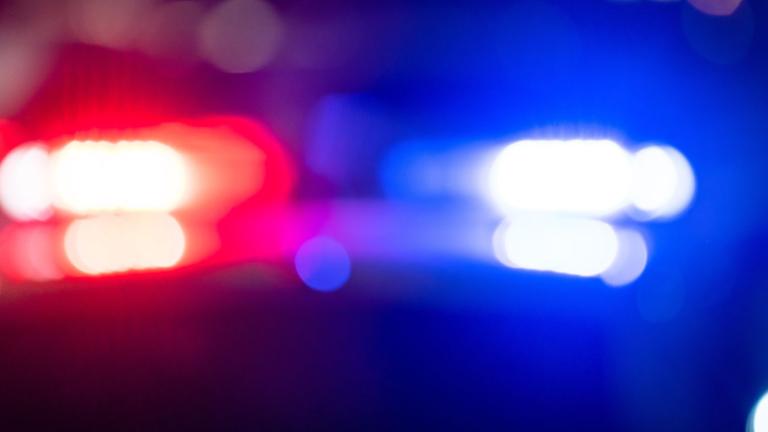 Red and blue lights of a police car.