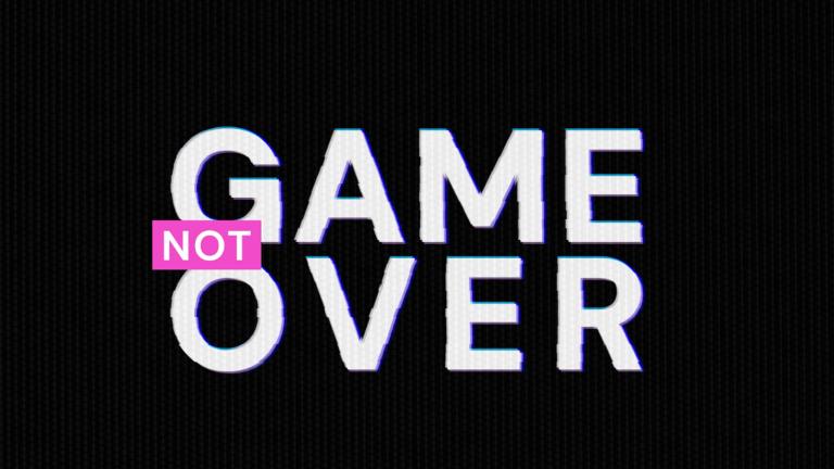 Computer screen with the words 'Game Not Over' on it.