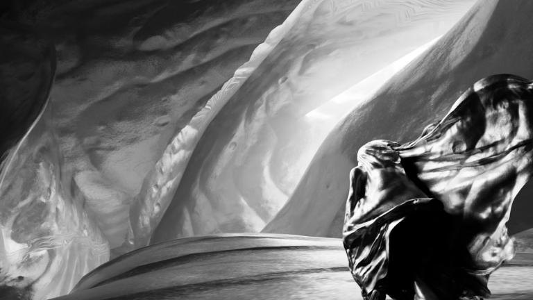 Detail from the art installation Inferno showing a figure wrapped in a billowing fabric standing before an undulating cave-like structure