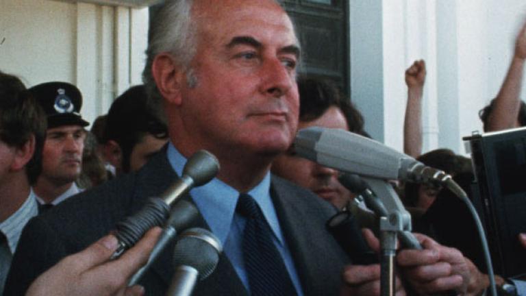 Gough Whitlam addressing a crowd of media and supporters on the steps of Parliament House.