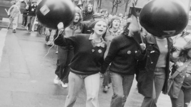 protest march, black and white image, 1973