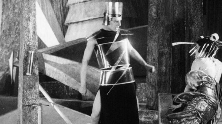 Two figures argue in a scene from the futuristic 1924 Russian science-fiction silent film Aelita, Queen of Mars