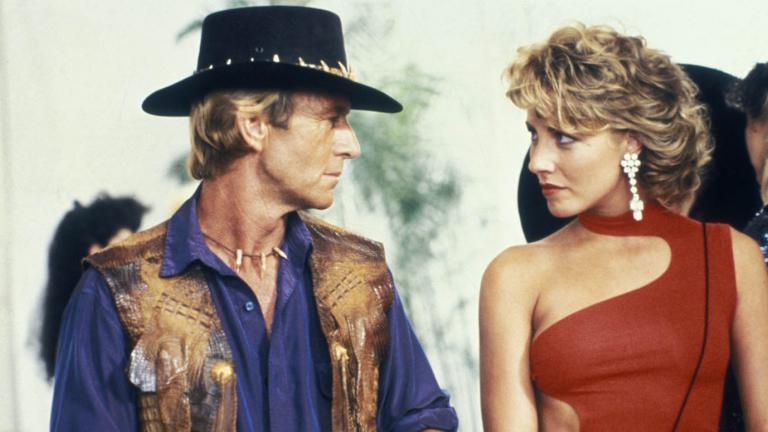 Paul Hogan looks at Linda Kozlowski in a still from the film Crocodile Dundee