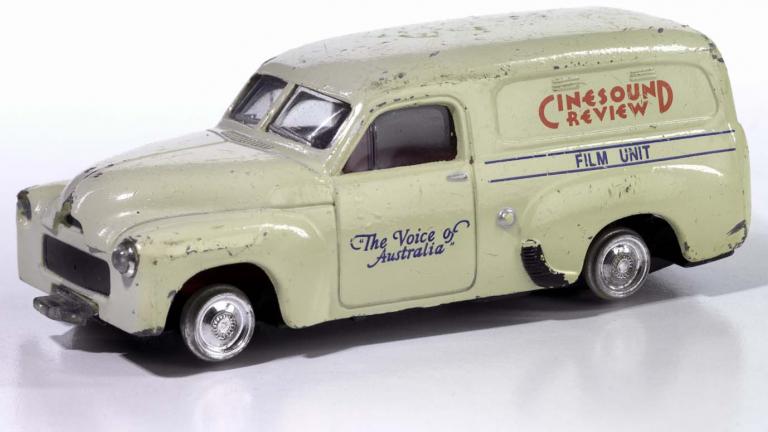 Die-cast scale model of a cream-coloured FJ Holden panel van used by Cinesound Review