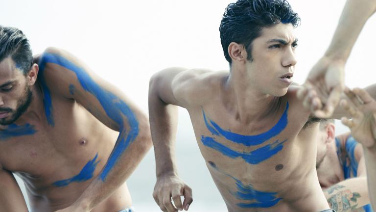 Production still from 'Spear' showing young Aboriginal men doing a traditional dance