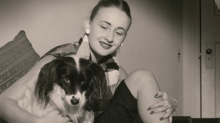 Amber Mae Cecil pictured with her dog.