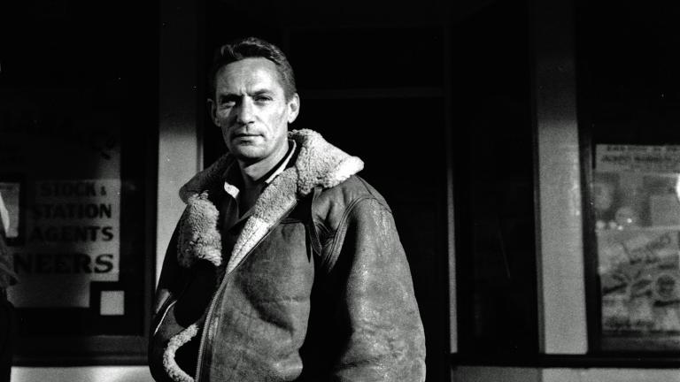 Film still from The Shiralee featuring Peter Finch.