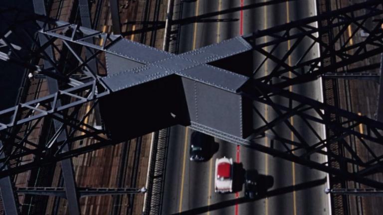 An overhead view of traffic on the Sydney Harbour Bridge in 1956