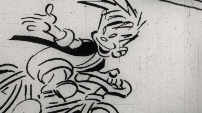 Cartoon character Ginger Meggs riding his bicycle, looking back over his shoulder with his thumb up