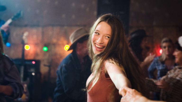Sophie Lowe laughing and looking at the camera in a scene from the film Beautiful Kate Sophie Lowe laughing and looking at the camera in a scene from the film Beautiful Kate