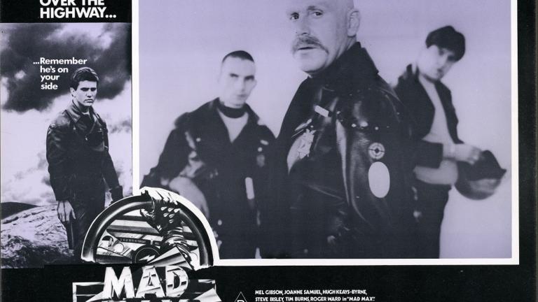 Lobby card for Max Max shows Fifi MacAffee (Roger Ward) and two others in leathers with bike helmets Lobby card for Max Max shows Fifi MacAffee (Roger Ward) and two others in leathers with bike helmets