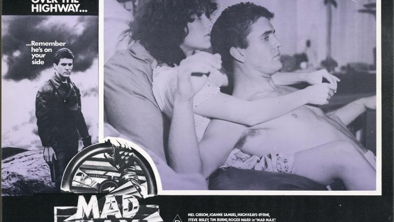 Lobby card for Mad Max shows Jess (Joanne Samuel) and Max (Mel Gibson). Lobby card for Mad Max shows Jess (Joanne Samuel) and Max (Mel Gibson).