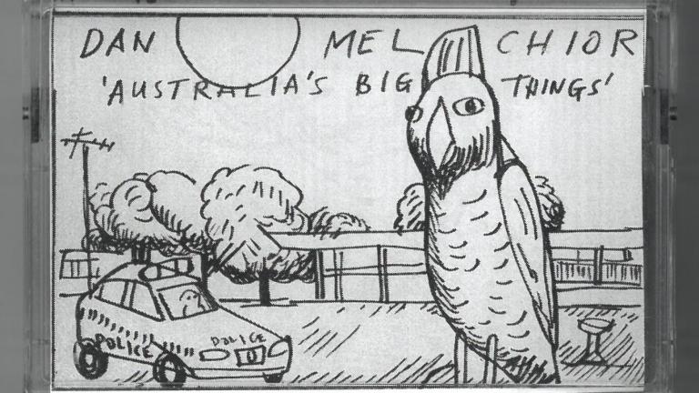 Cassette cover featuring a crude drawing of a cockatoo and a police car in the suburbs. Text reads: Dan Melchior. Australia's Big Things. Cassette cover featuring a crude drawing of a cockatoo and a police car in the suburbs. Text reads: Dan Melchior. Australia's Big Things.