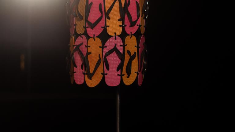 The Thong Dress from the film The Adventures of Priscilla, Queen of the Desert displayed on stage on a stand