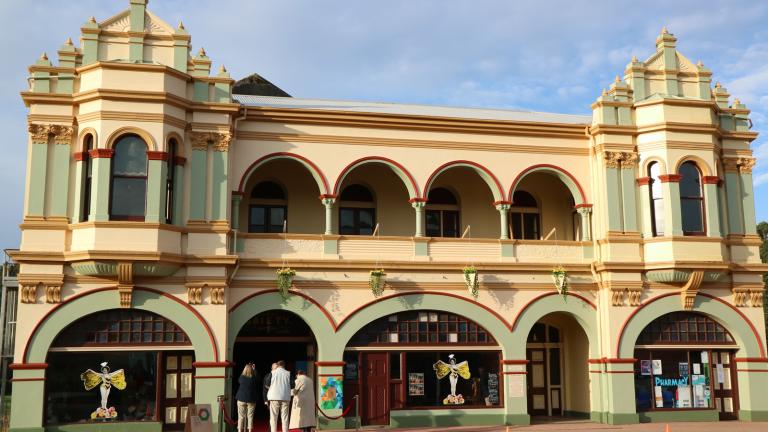 Exterior of an old theatre, circa 1900.