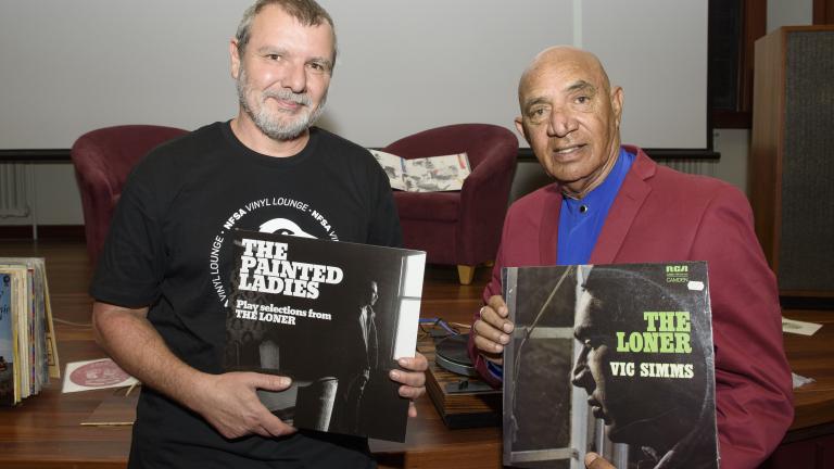 Sound curator Thorsten Kaeding and Vic Simms Sound curator Thorsten Kaeding and Vic Simms holding copies of Vic's records The Painted Ladies and The Loner