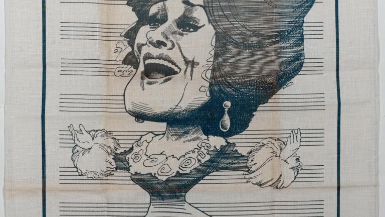 Dame Joan Sutherland souvenir tea towel A tea towel featuring a caricature of Dame Joan Sutherland.