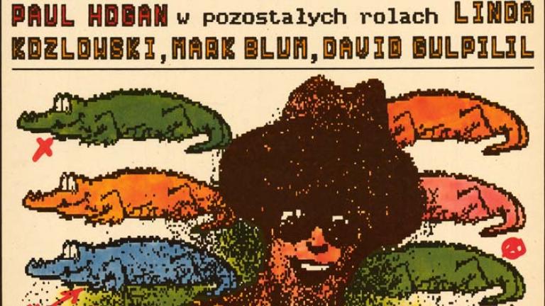 Polish Crocodile Dundee poster Polish poster for Crocodile Dundee featuring eight multi-coloured crocodiles, a smiling man in a hat and sunglasses and someone screaming underneath him