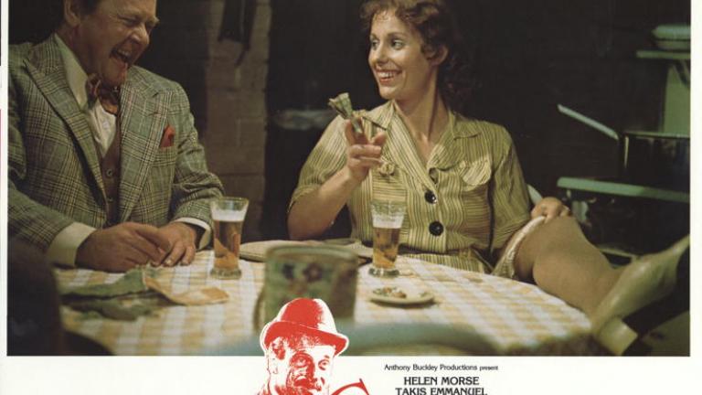Caddie lobby card  lobby card featuring John Ewart as Paddy seated at a table and laughing uncontrollably with and Helen Morse as Caddie.