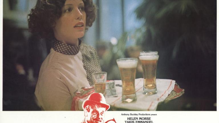 Caddie lobby card with Helen Morse as Caddie serving beer on a tray in a pub.
