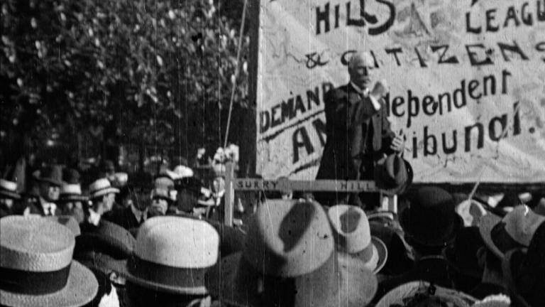 A group of people wearing hats at a protest during the Great Strike of 1917