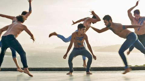 Still from the film Spear showing a group of six young Aboriginal men performing a traditional dance.