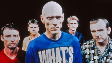 The five members of Australian rock band Midnight Oil. Lead singer Peter Garrett is at centre front of the photo. 