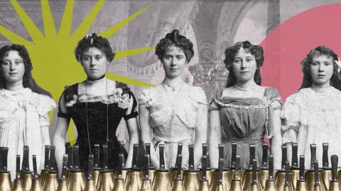 Five women standing in a row against a colourful background. In front of them are a lot of bells
