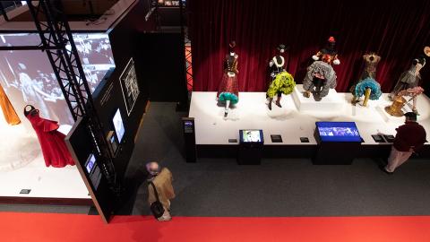 An overhead look at film costumes on display at the Australians & Hollywood exhibition at the NFSA
