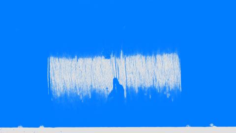 An extreme close-up of the grooves in a vinyl record; the image has been tinted blue