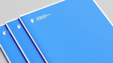 Documents featuring a white National Film and Sound Archive kookaburra logo on a blue cover