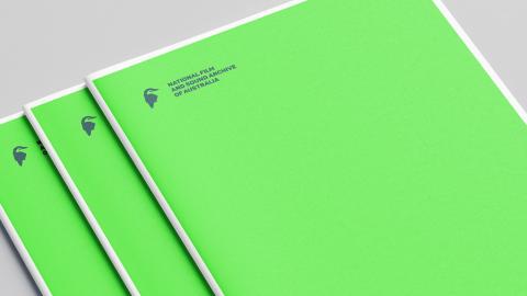 Documents featuring a black National Film and Sound Archive kookaburra logo on a lime green cover