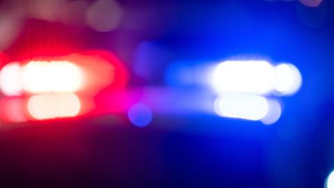 Red and blue lights of a police car.