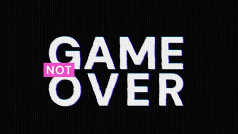 Computer screen with the words 'Game Not Over' on it.