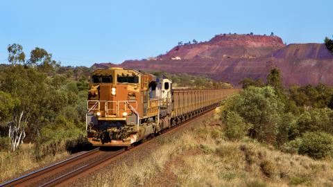 A loaded ore train leaving the Mount Whaleback mine site at Newman in Western Australia